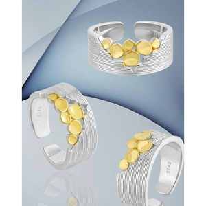 Three S925 sterling silver rings with gold textured scales and adjustable open band