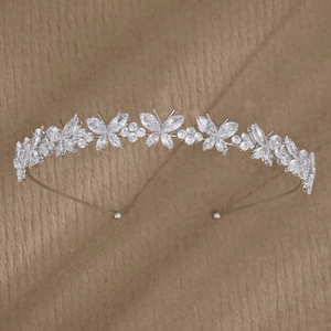 Detailed view of butterfly headband with silver metal and sparkling cubic zirconia crystals