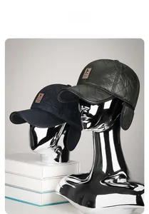Close-up of diamond-quilted winter baseball cap with foldable earflaps and sport tag