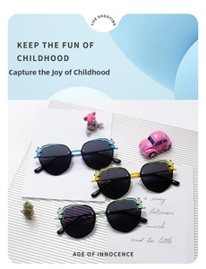 Close-up of three polarized kids sunglasses with panda decor and colorful metal temples