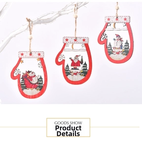 Detailed view of three wooden glove-shaped Christmas ornaments with Santa and Snowman prints