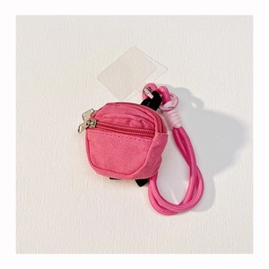 Pink canvas mini backpack coin purse with zipper closure and matching neck lanyard