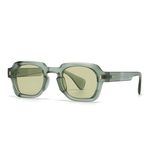 Modern retro sunglasses with translucent grey-green frames and light yellow lenses