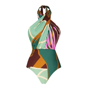 Macro detail of cross halter neckline with abstract geometric print on one-piece swimsuit