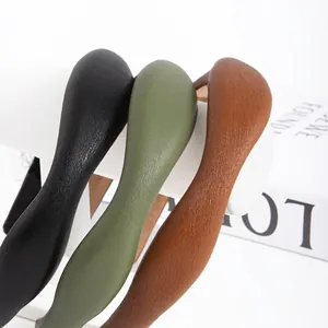 Classic faux leather headband with lychee texture in black, brown, and olive green