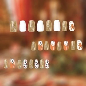 Christmas reindeer press-on nails with gingerbread and glitter designs in coffin shape