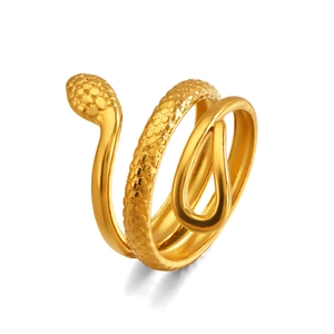 Elegant gold snake-shaped wrap ring with scale engraving on a minimalist white background