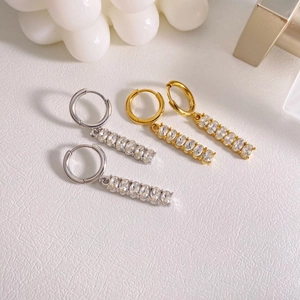 Polished stainless steel hoop earrings with sparkling cubic zirconia fringe tassels