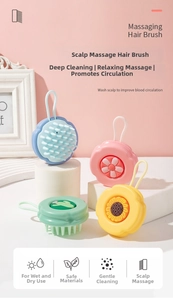 Macro detail of silicone scalp massager brushes with hanging ropes and floral designs