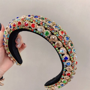 Detailed macro view of vibrant colorful rhinestones on a thick padded baroque headband