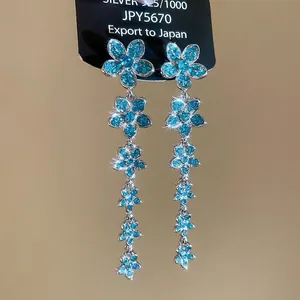 S925 Silver long tassel earrings with light blue zircon flower petals for women