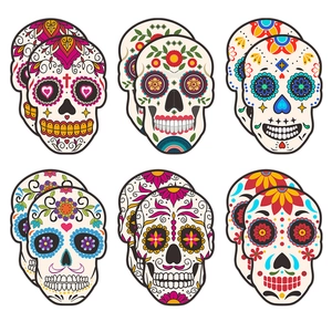 Detail of colorful sugar skull masks for Day of the Dead party paper straw decorations