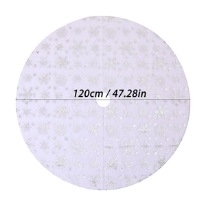 Detail showing 120cm white plush Christmas tree skirt with silver sequin snowflakes