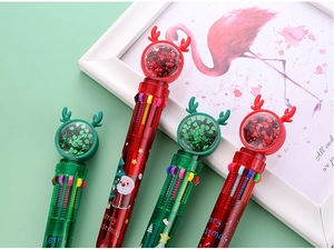 Detail of Christmas 10-color ballpoint pen with elk antlers and glitter sequin ball