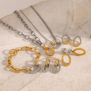 Two-tone stainless steel jewelry set with geometric chain necklaces and hoop earrings