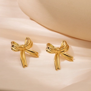 Minimalist 18K gold plated bow knot stud earrings on elegant silk background