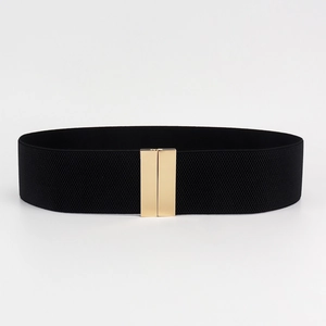 Detail of a 5cm black wide elastic waist belt with a golden rectangular metal buckle