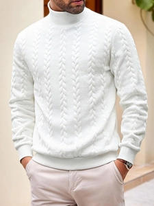 Close-up of white turtleneck sweater for men featuring classic cable knit texture