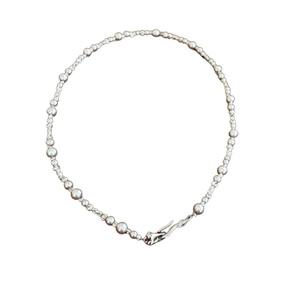 French style silver pearl bead necklace with unique metal hook clasp on white background