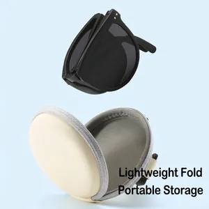 Foldable UV400 polarized sunglasses with oval frame and a portable leather storage case