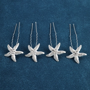 Set of four silver starfish U-shaped hair pins with sparkling white rhinestones for bridal