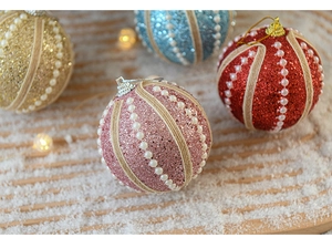Detail of pink Christmas foam ball with glitter finish and pearl chain decoration