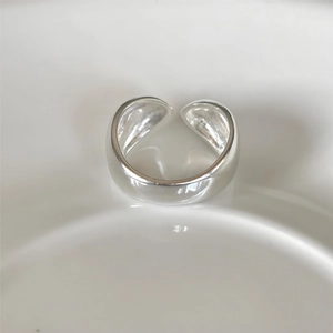 Modern 925 sterling silver wide-open water drop ring with minimalist polished surface