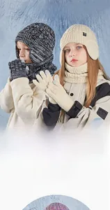 Detail of children's winter knit set showing thick fleece lining inside the beanie hat