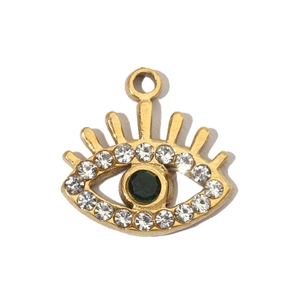 Detail of gold evil eye pendant featuring green gemstone and clear cubic zirconia stones
