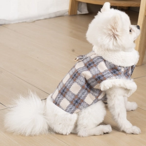 Blue and gray plaid warm dog vest with white faux fur trim and back traction D-ring