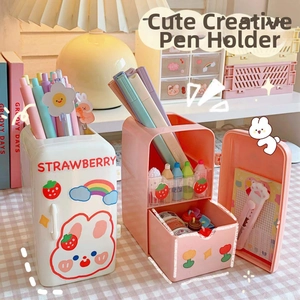 Detail view of refrigerator-shaped pencil holder with storage drawers and cute stickers
