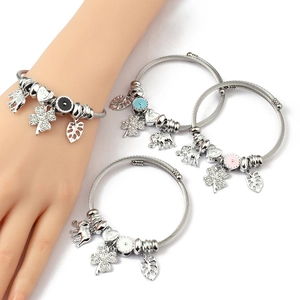Silver cable charm bracelet with crystal clover, elephant and Be My Valentine heart pendant