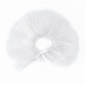 Macro view of white multi-layer tutu skirt featuring a satin ribbon bow tie detail
