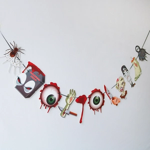 Detail of Halloween banner featuring spooky elements like skulls and eyeballs on cards