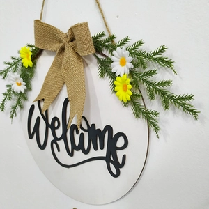 Wooden welcome wreath with burlap bow and daisies for Easter home wall decor