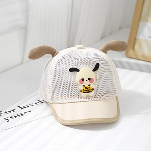 Detail of breathable mesh fabric and cute plush dog ears on a baby baseball cap