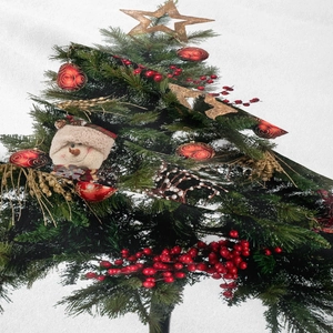 Dettaglio della trama del tessuto intrecciato con stampa albero di Natale e bacche rosse
