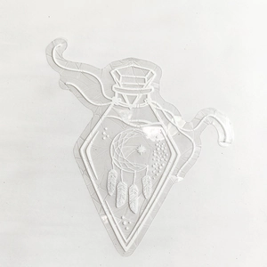 Macro view of clear silicone dreamcatcher mold with geometric details for resin crafting