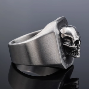 Vintage punk skull ring in brushed stainless steel with gothic silver finish