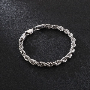 Macro shot of 6mm silver rope chain bracelet showing detailed high-quality metallic luster
