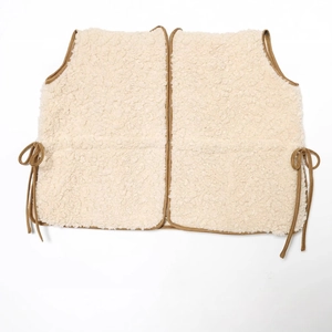 Minimalist beige sherpa vest with brown trim and adjustable side drawstrings