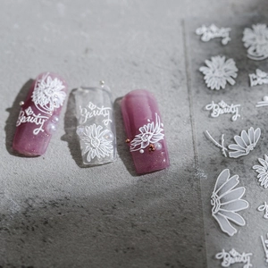 3D white daisy floral embossed nail stickers with elegant beauty lettering on purple nails