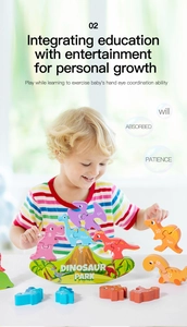 Detailed view of child stacking colorful wooden dinosaur blocks for balance and motor skills
