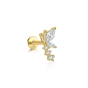 Macro detail of S925 sterling silver butterfly ear stud with zircon stones on white background