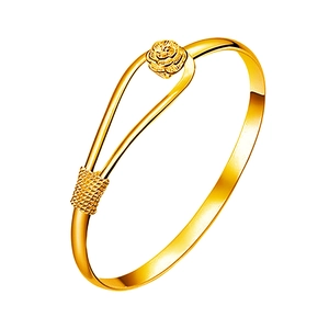 Detailed view of a gold floral bangle featuring 3D rose flower and braided metal texture