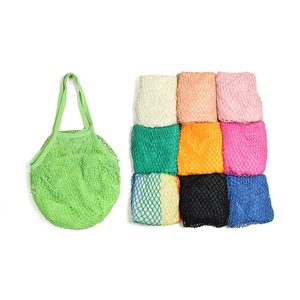 Mesh grocery bag showing green open style and nine various colorful folded options
