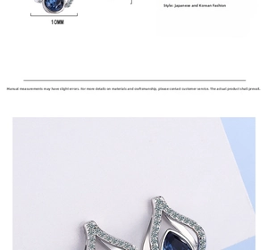 Detail view of 10mm teardrop blue crystal earring with cubic zirconia and silver plating