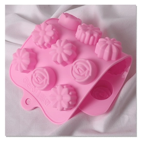 Close-up of pink flower silicone mold showing flexible texture and hanging hole detail