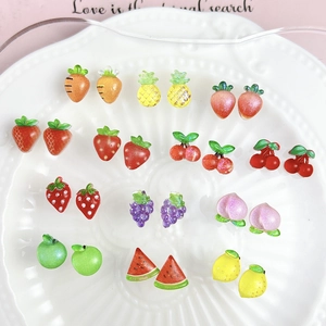 Close-up of 9 pairs of cute 3D resin fruit nail art charms and DIY jewelry accessories