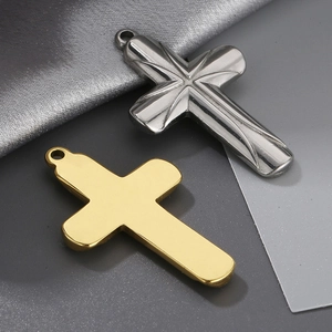 Detailed comparison of gold and silver stainless steel cross pendants with matte finish